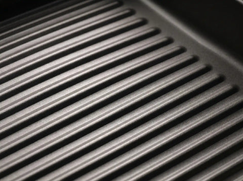 Close-up of the ridged base of a PureTi titanium baking tray
