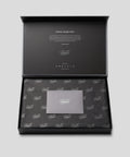 Black open box with 'PureTi' branding on a light gray background
