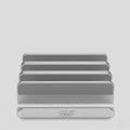 Aluminium cutting board stand with "PureTi" logo