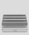 Aluminium cutting board stand with "PureTi" logo
