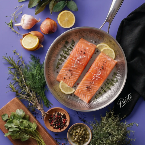 Raw salmon fillets in a pan with herbs and lemons on a purple background, featuring the brand 'Pareti'.
