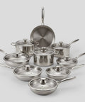 PureTi titanium cookware set of hammered pans and pots with glass lids on a light gray background